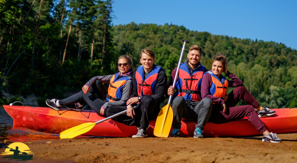 Boys and girls are sitting on the kayak