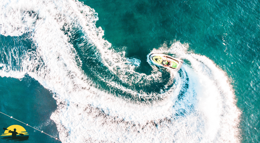 jet ski riding into the ocean