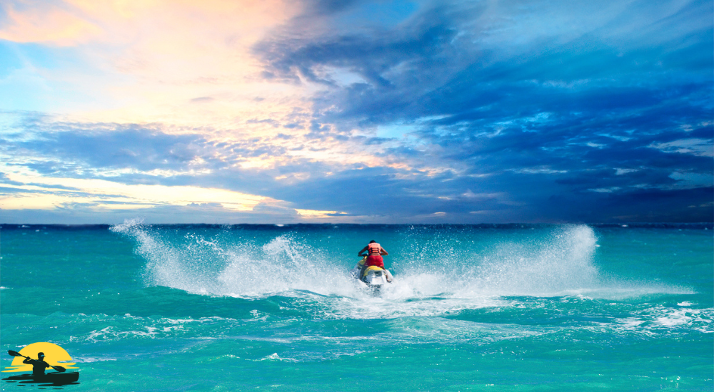 a man is driving jet ski in the sea