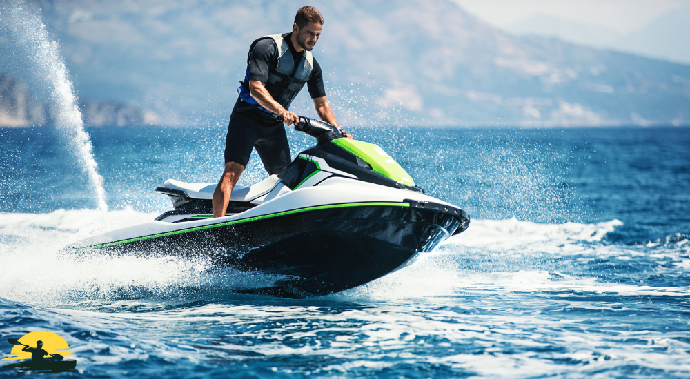 a man driving a jet ski on the sea