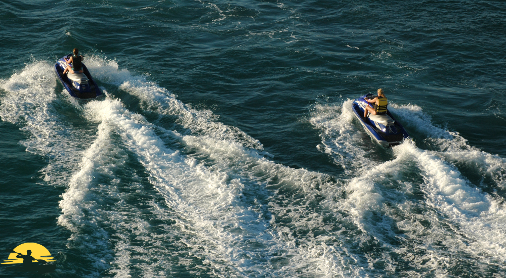 A man is riding a jet ski