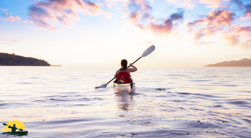 A lady kayaking in sea