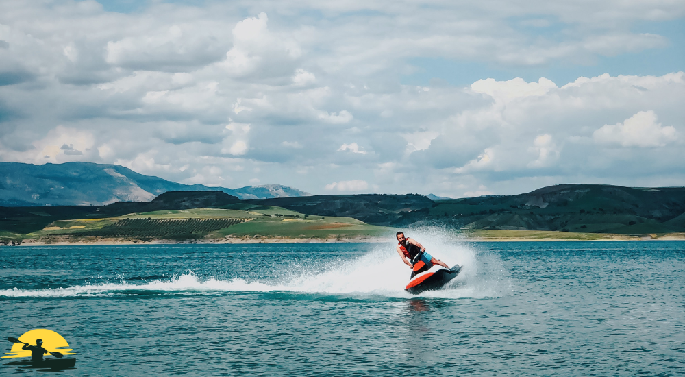 a man riding a jet ski in the sea