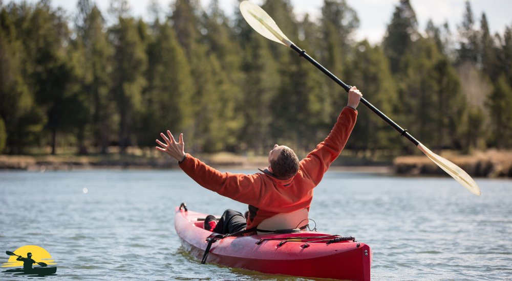 A man is driving canoe 