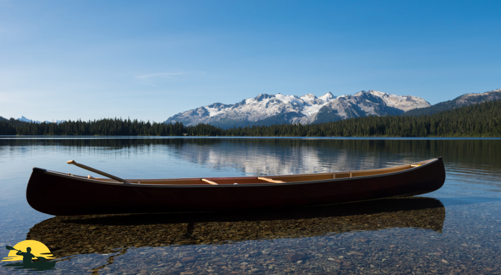A canoe is standing beside the lake