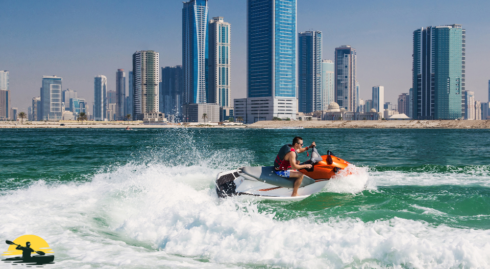 A man is riding a jet ski