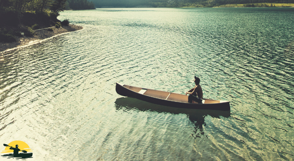 A man is sitting on the boat