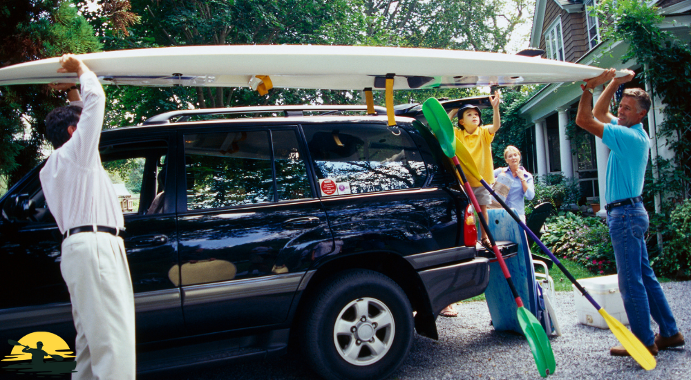 strapping the kayak together 