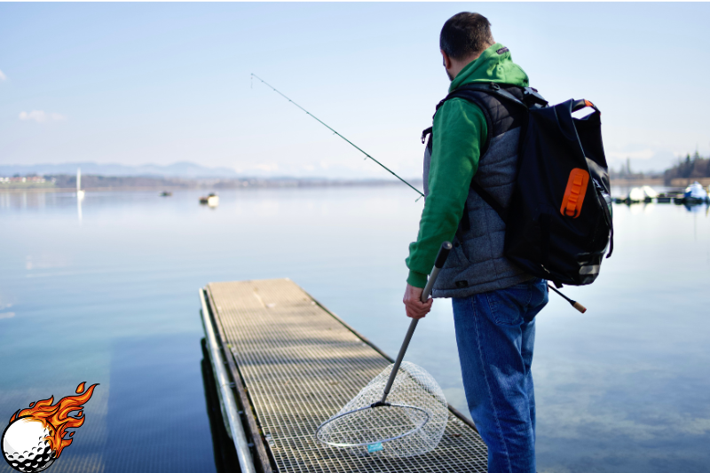 A man is trying to catch fishes