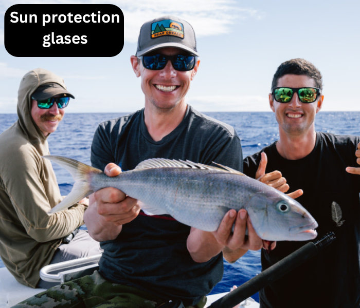 3 men are showing a fish 