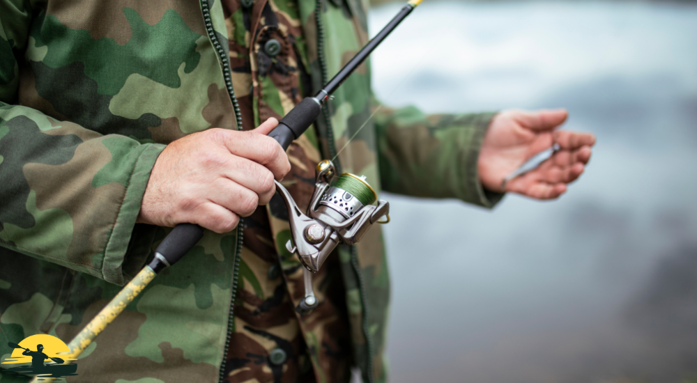 A man is holding a fishing rod