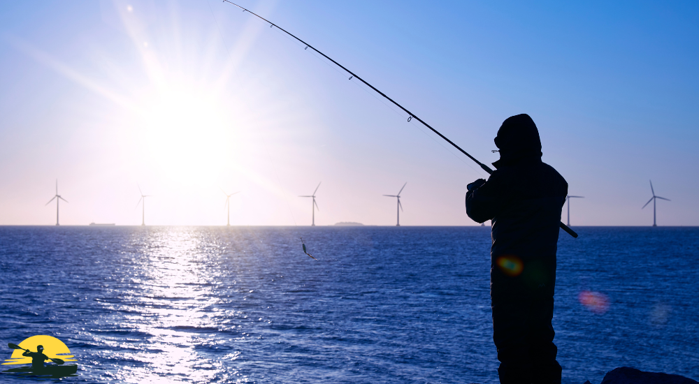 A man is fishing on sea side