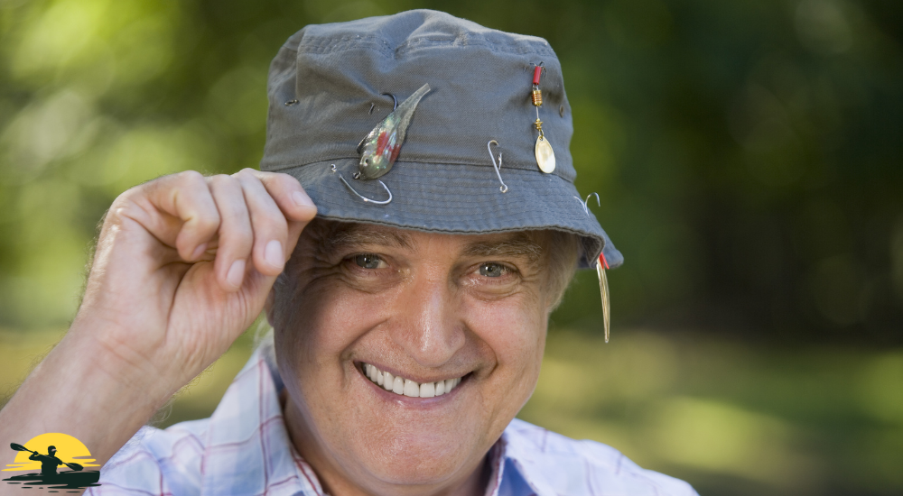 A man wearing hat and smiling