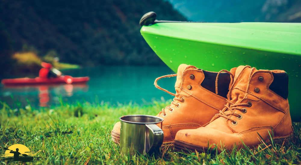 A shoe besides a lake