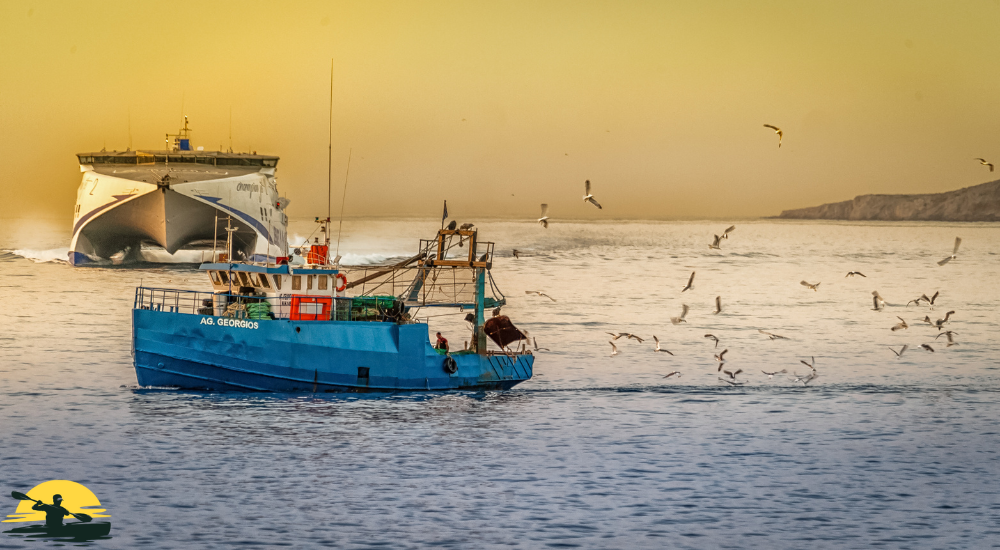 Two boats are crossing each other