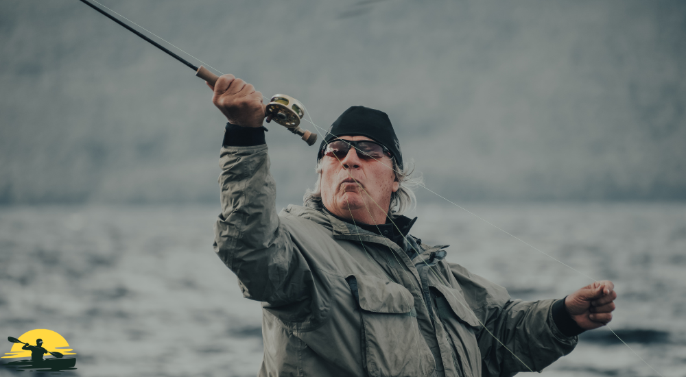 A man is casting a fishing rod on a riverside