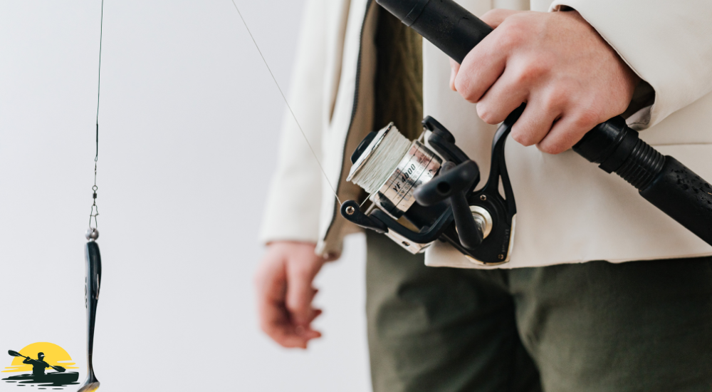 A man with a fishing rod in hand