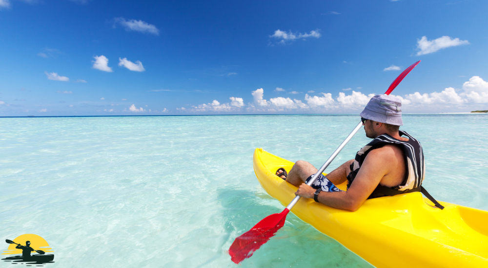 A man and lady kayaking together